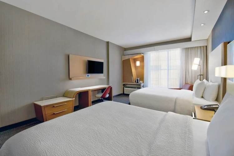 Standard Quadruple room with courtyard view