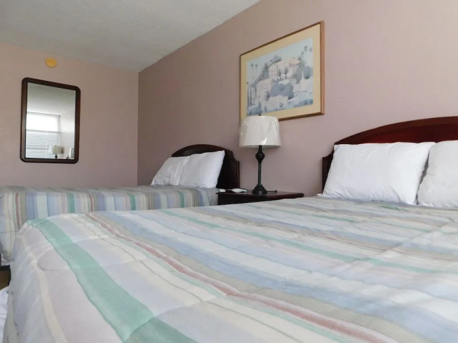 Apm Inn & Suites
