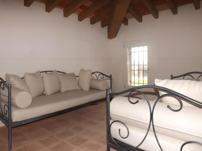 Standard Triple room with garden view