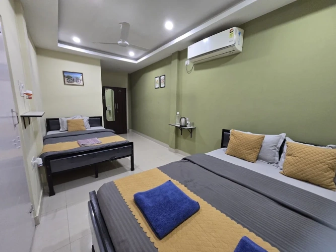 Standard Triple room with balcony and with garden view