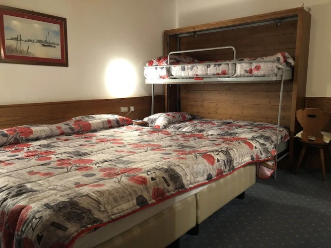 Standard Quadruple room with balcony and with garden view