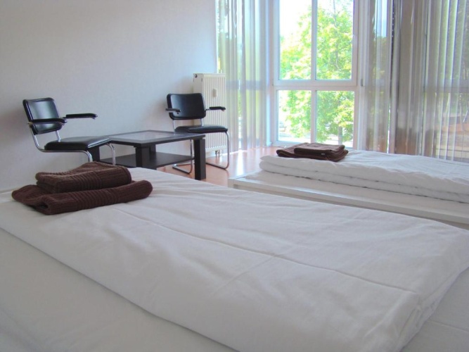 Standard Triple room with garden view