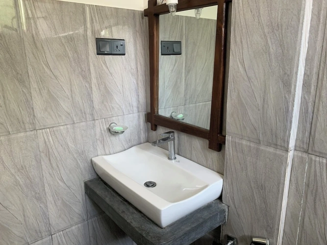 Deluxe Triple room with garden view