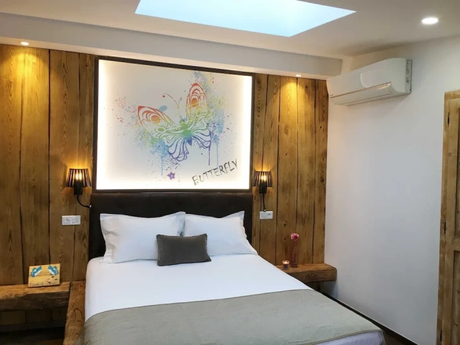 Standard Triple room with garden view