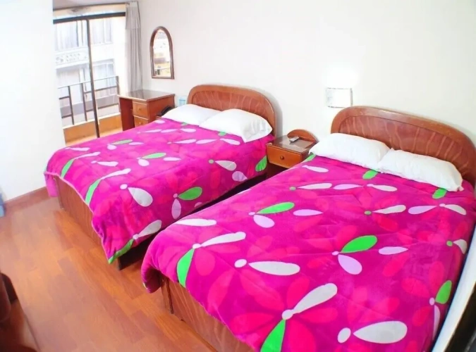 Deluxe Quadruple room with balcony