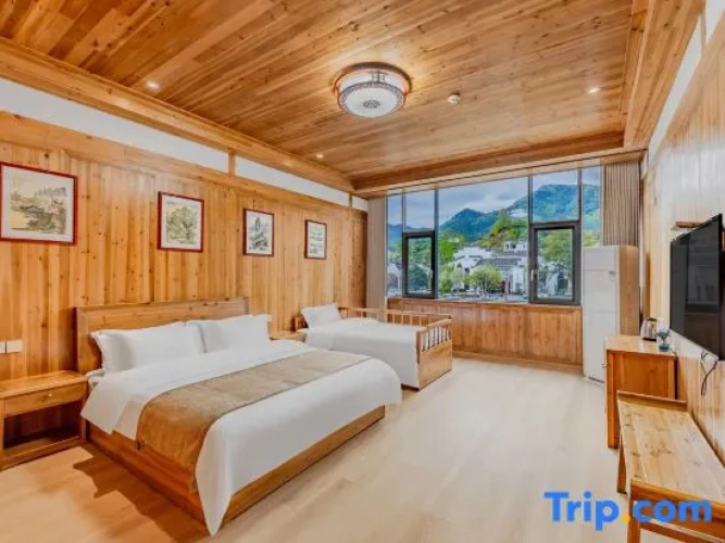 Standard Triple room with river view