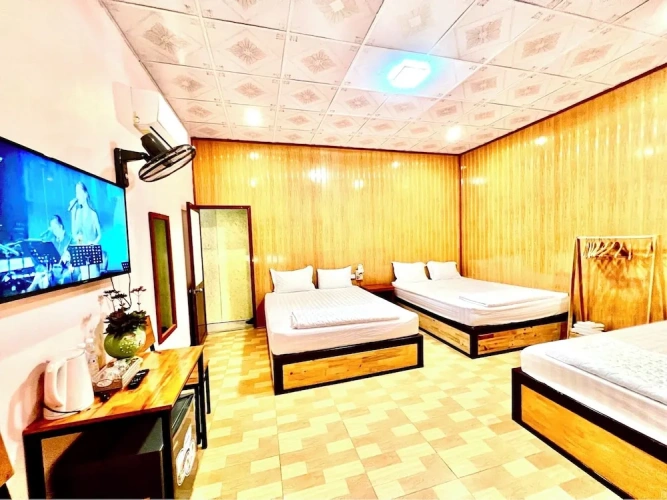 Standard Triple Family room with balcony and with courtyard view