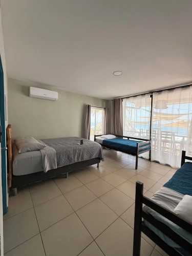Standard Quadruple room with balcony and with sea view