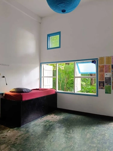 Deluxe Triple room with balcony and with garden view