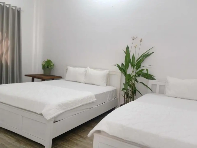 Standard Triple room with garden view