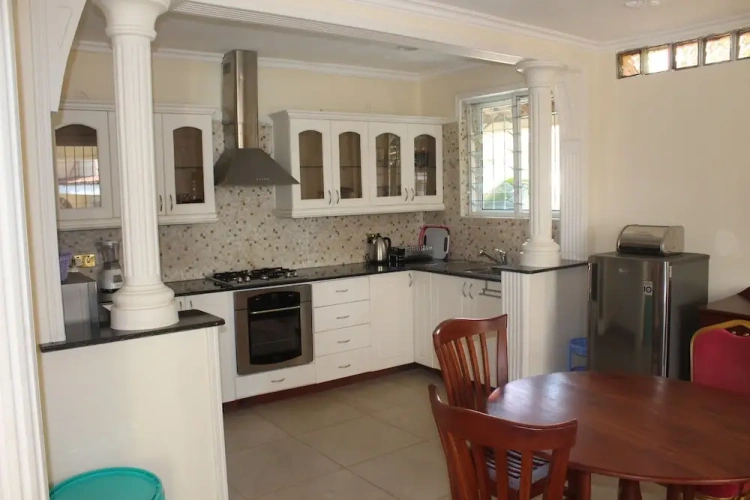 Deluxe Double Basement room with balcony and with garden view