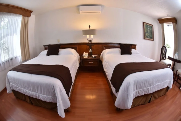 Standard Quadruple room with garden view