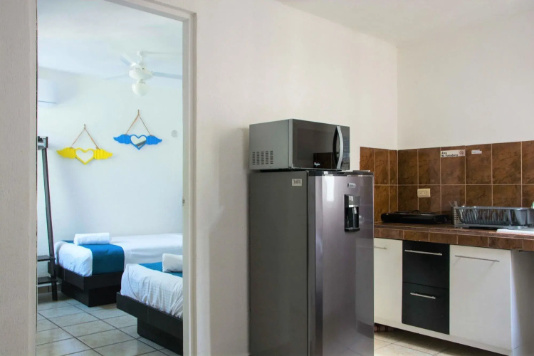 Mora Apartment by Andiani