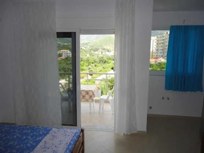 Standard Quadruple room with balcony and with garden view