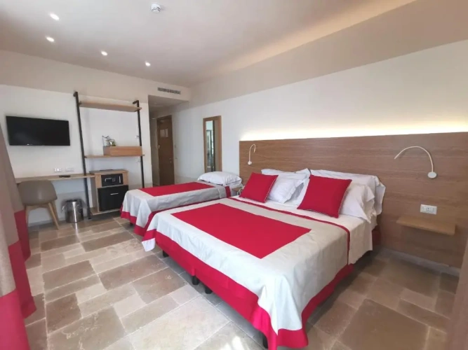 Standard Triple room with garden view