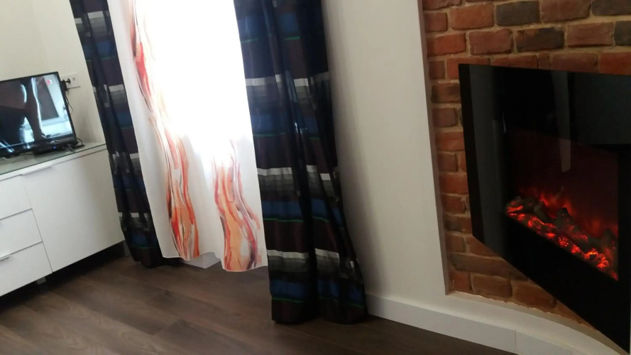 Apartment with fireplace