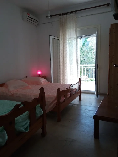Standard Triple room with balcony and with garden view