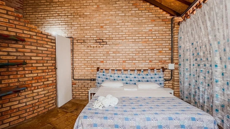 Standard Triple room with garden view