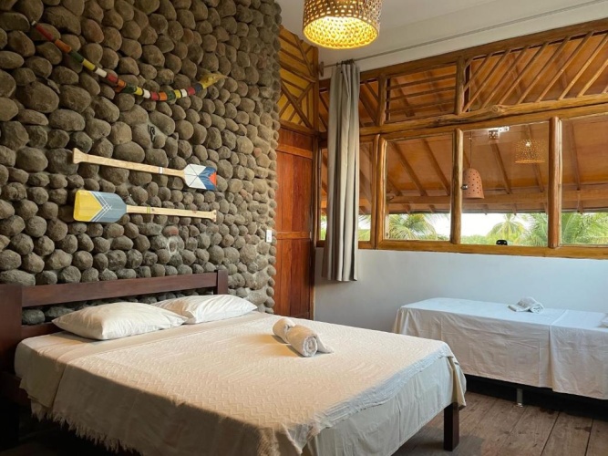 Standard Triple room with garden view