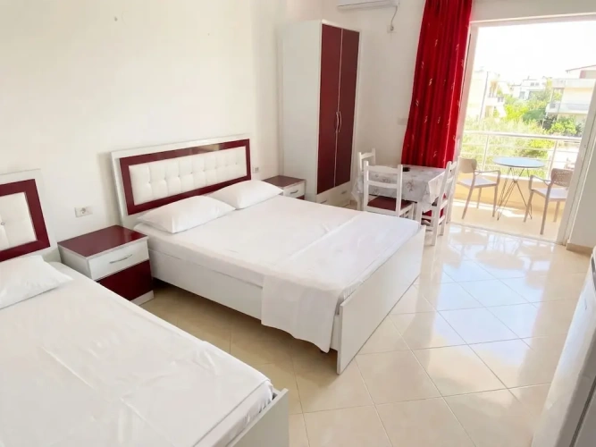 Comfort Triple room with balcony and with partial sea view
