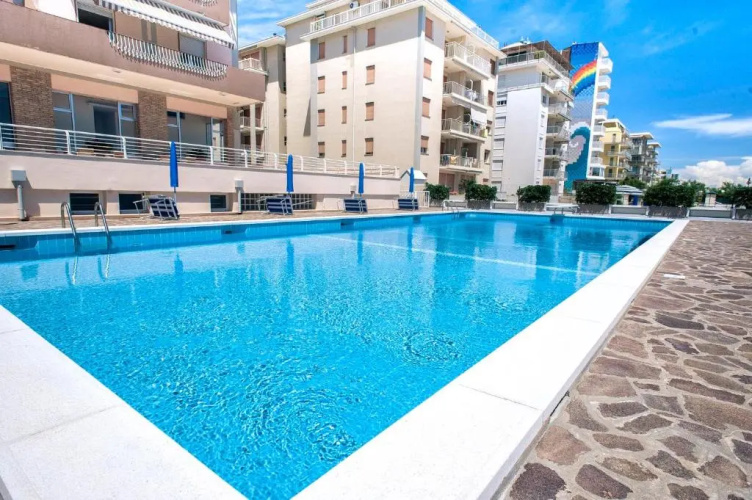 Sea view apartment with swimming pool