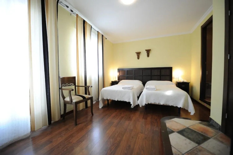 Standard Quadruple room with balcony and with city view