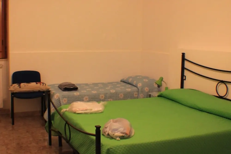 Deluxe Quadruple room with balcony and with garden view