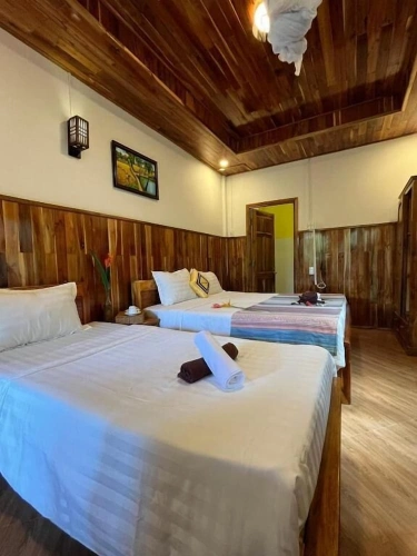 Standard Triple room with balcony and with garden view