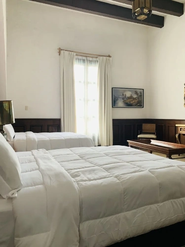 Deluxe Quadruple room with balcony