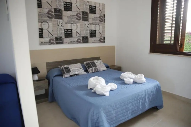 Standard Triple room with garden view