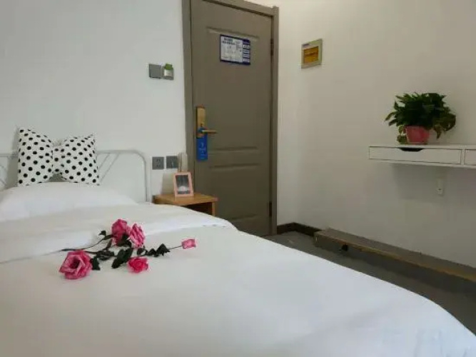 Daqing Boger Hotel (Xinmate Store)