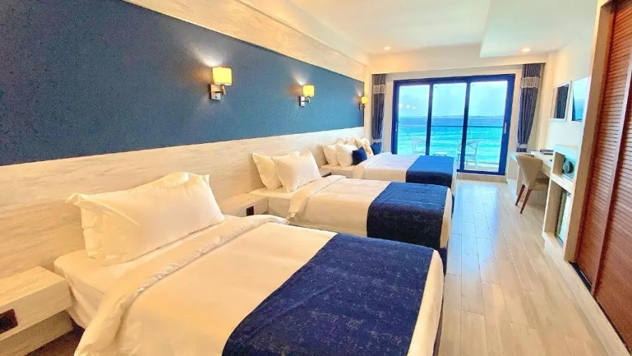 Deluxe Quadruple room with balcony and with sea view