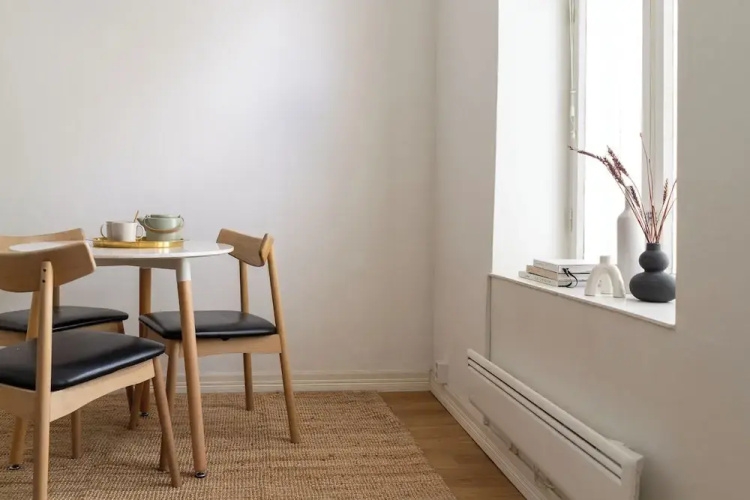 A bright wooden studio for four