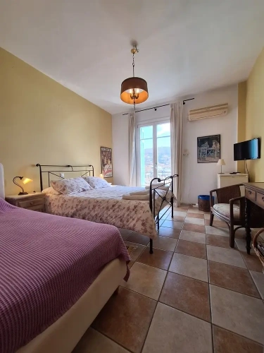 Superior Triple room with balcony and with sea view