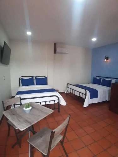 Standard Quadruple room with balcony and with courtyard view