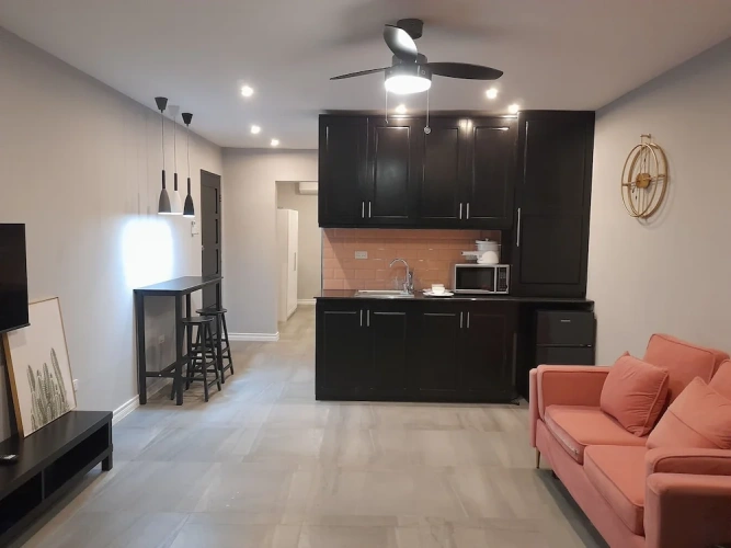 1 Bedroom Deluxe Basement Suite with balcony and with pool view