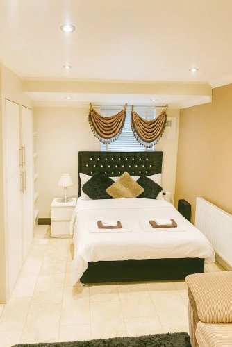 Deluxe Quadruple room with balcony and with courtyard view