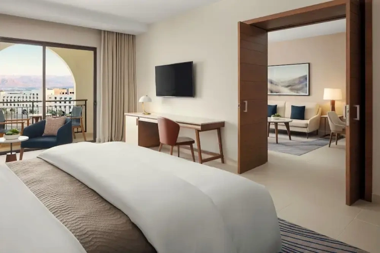 Double Suite with balcony and with pool view