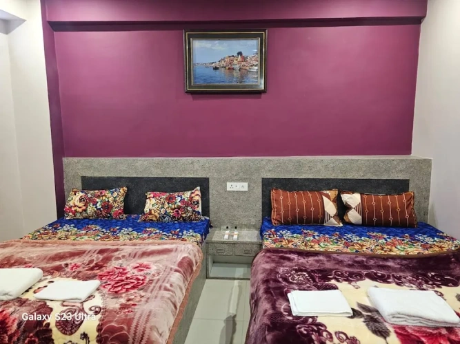Deluxe Quadruple room with city view