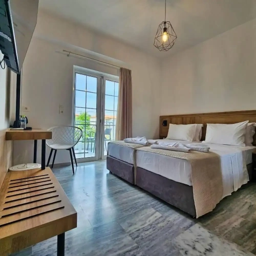 Deluxe Quadruple room with balcony