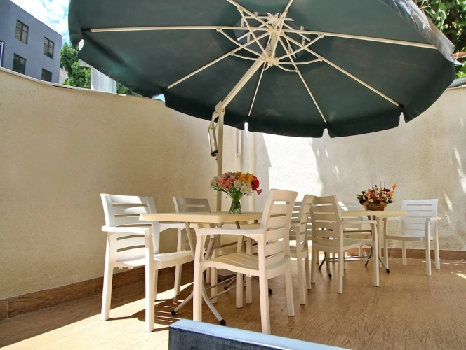 Standard Triple room with garden view