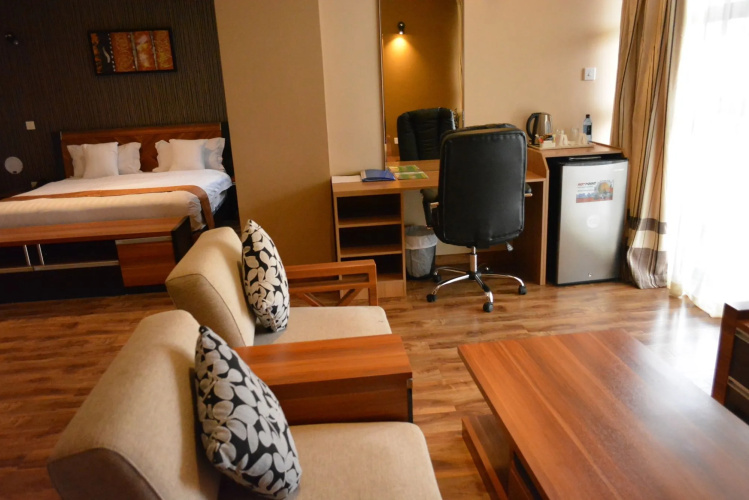 WE Hotel and Suites