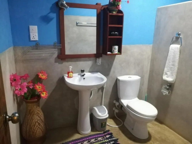 Standard Triple room with balcony and with garden view