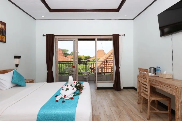 Deluxe Double room with balcony and with garden view