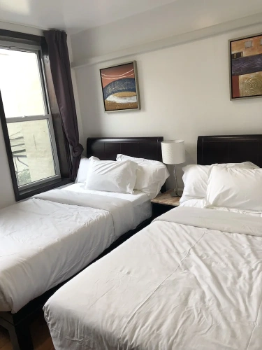 Deluxe Quadruple room with city view