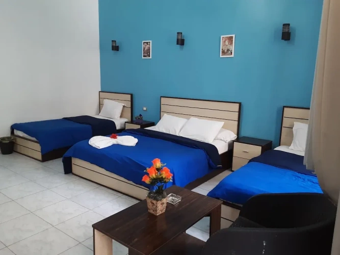 Deluxe Quadruple room with balcony and with city view