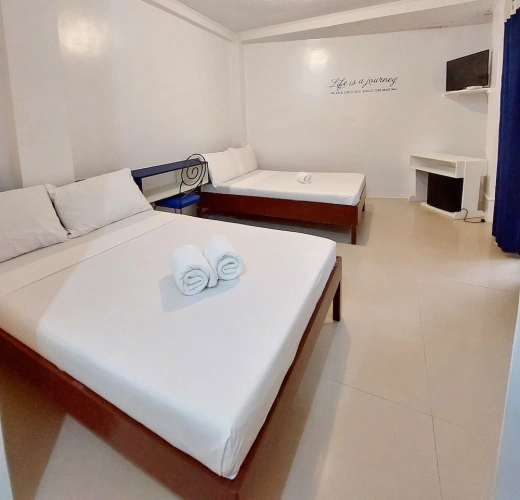 Deluxe Quadruple room with balcony