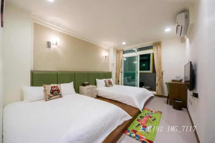 Standard Quadruple room with garden view