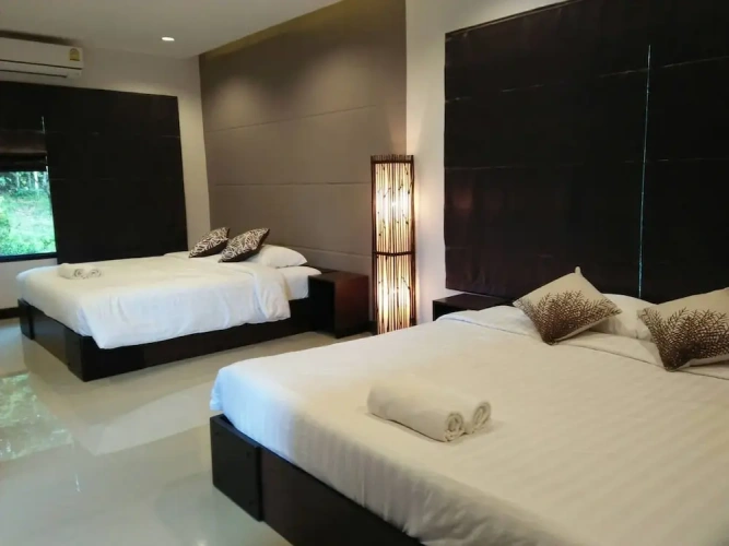 Standard Quadruple room with garden view