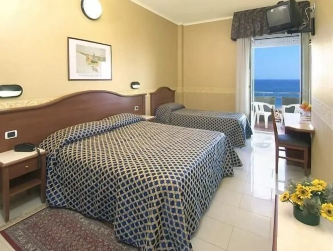 Standard Triple room with balcony
